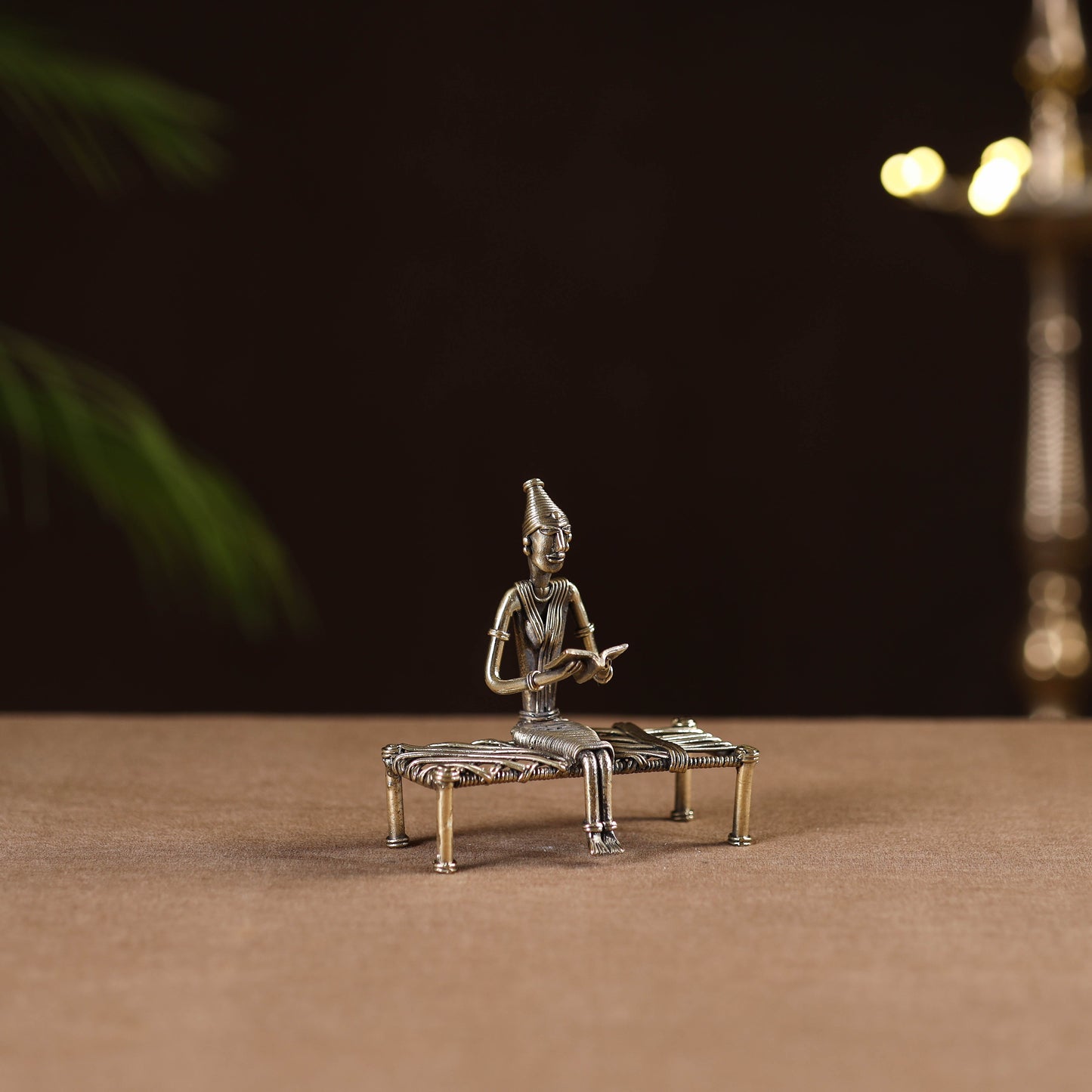 Reading women on bed - tribal odisha dokra handmade home