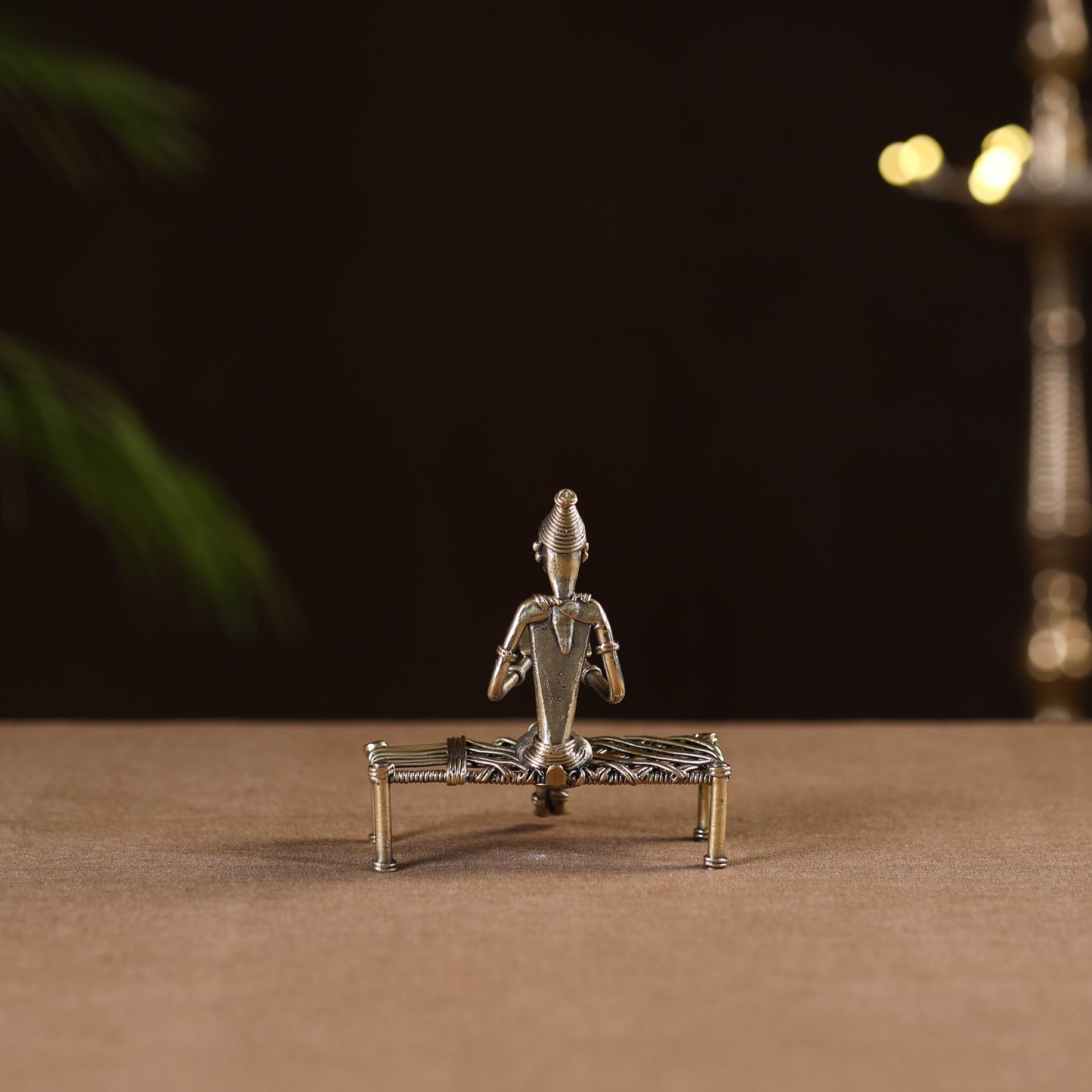 Reading women on bed - tribal odisha dokra handmade home