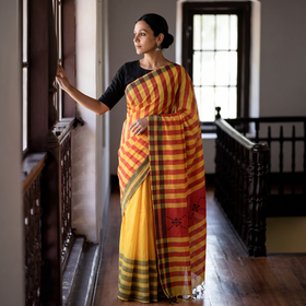 Yellow & Red Mulberry Silk Saree with Single Jaal Pattern on Pallu & Yellow Stripes with Plain Body, draped and worn by a woman, AI visual of the saree, iTokri