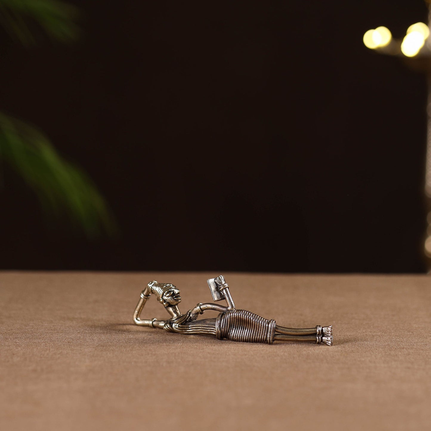 Side sleeping lady with book - tribal odisha dokra handmade