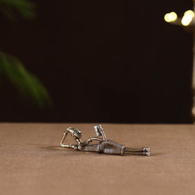 Side sleeping lady with book - tribal odisha dokra handmade