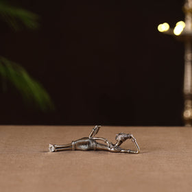 Side sleeping lady with book - tribal odisha dokra handmade