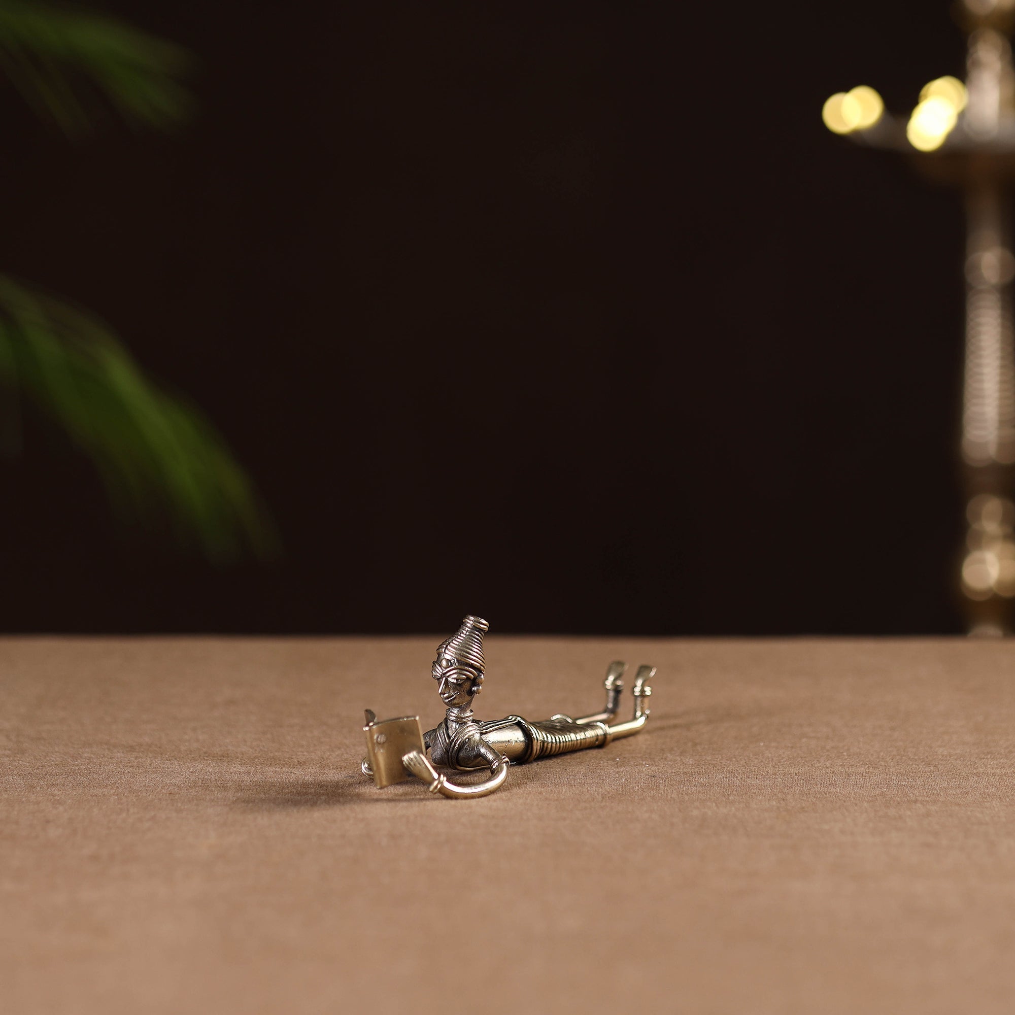 Sleeping lady with book - tribal odisha dokra handmade home