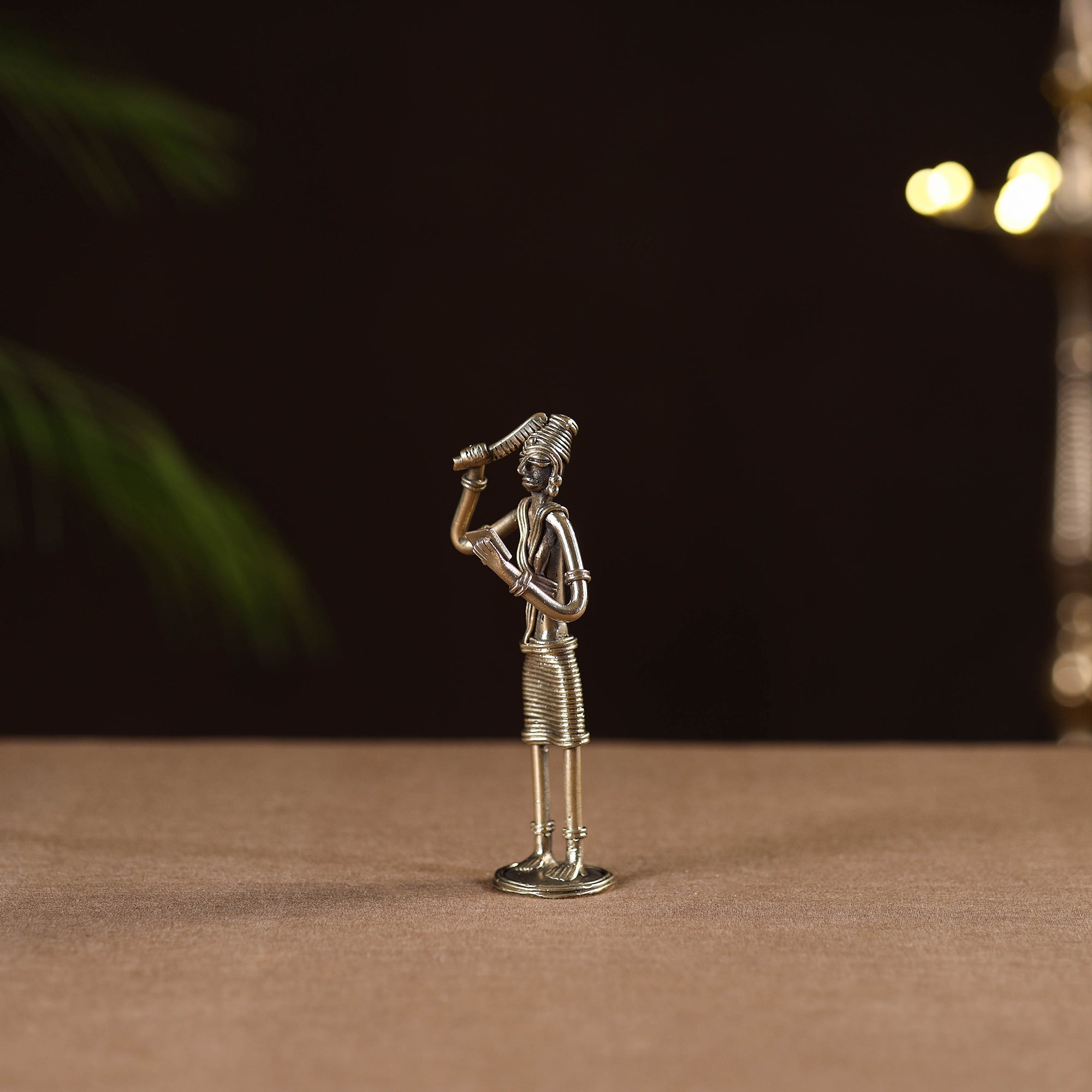 Standing women with combing - tribal odisha dokra handmade