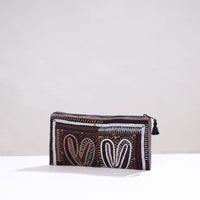 embroidery clutch