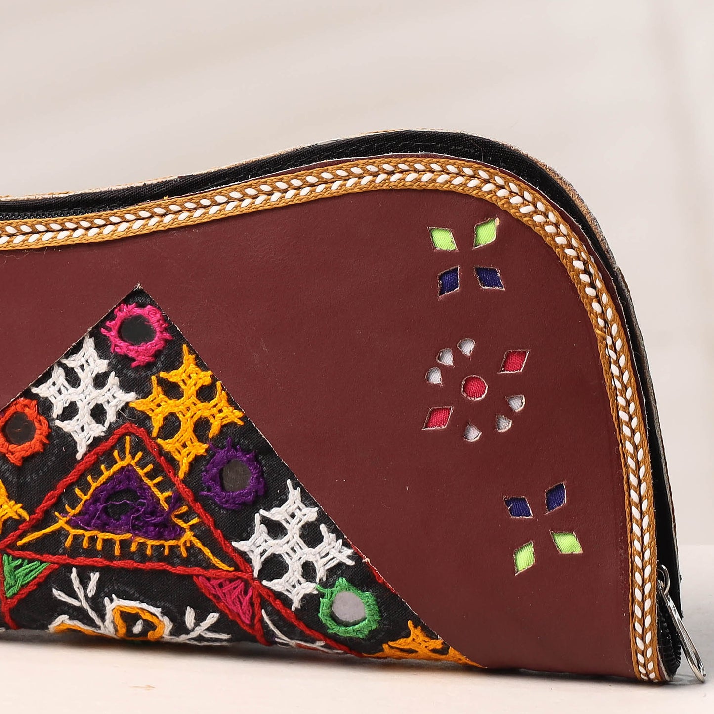 embroidery leather clutch