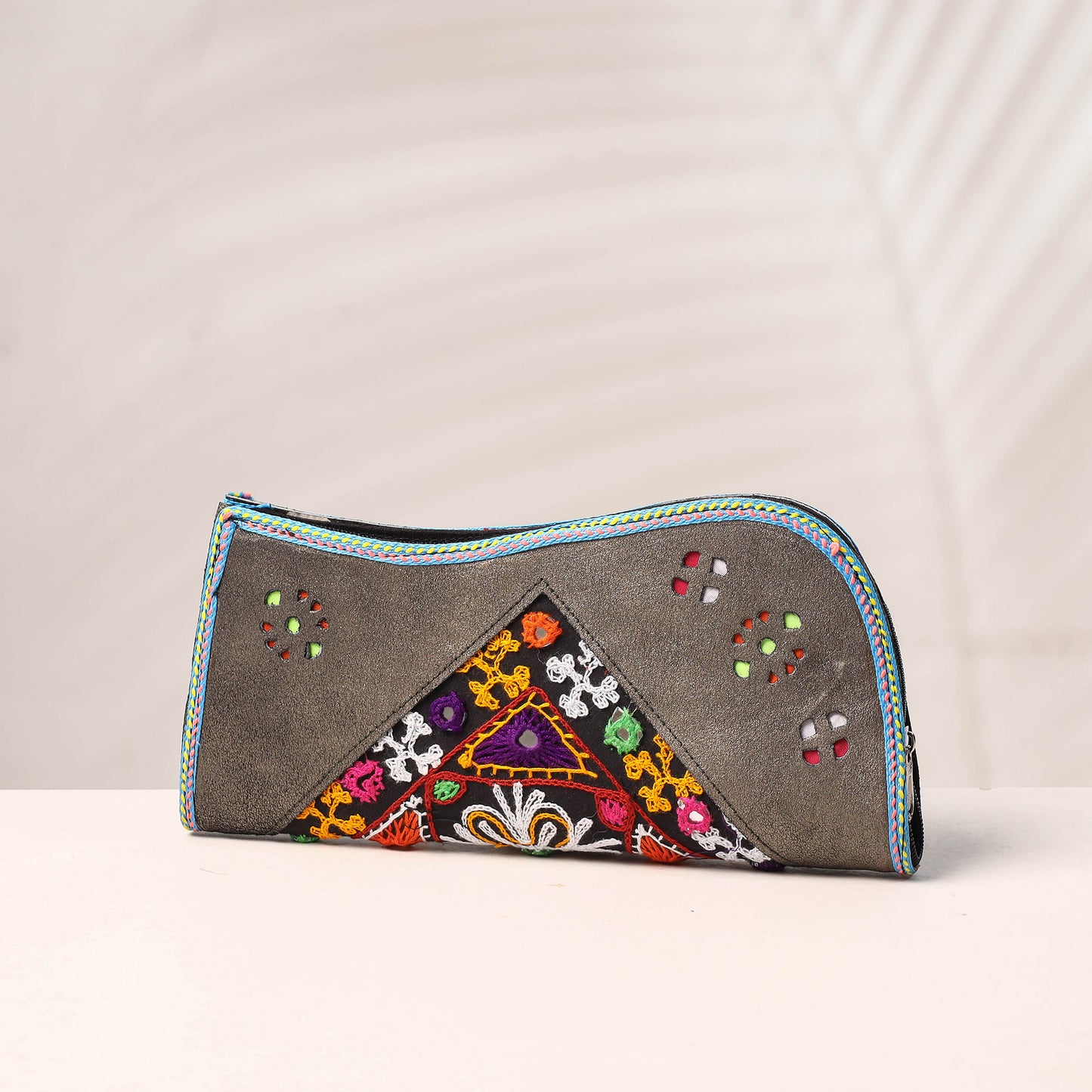 embroidery leather clutch