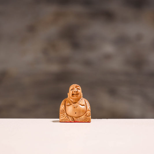 wooden laughing buddha
