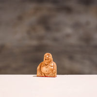 wooden laughing buddha