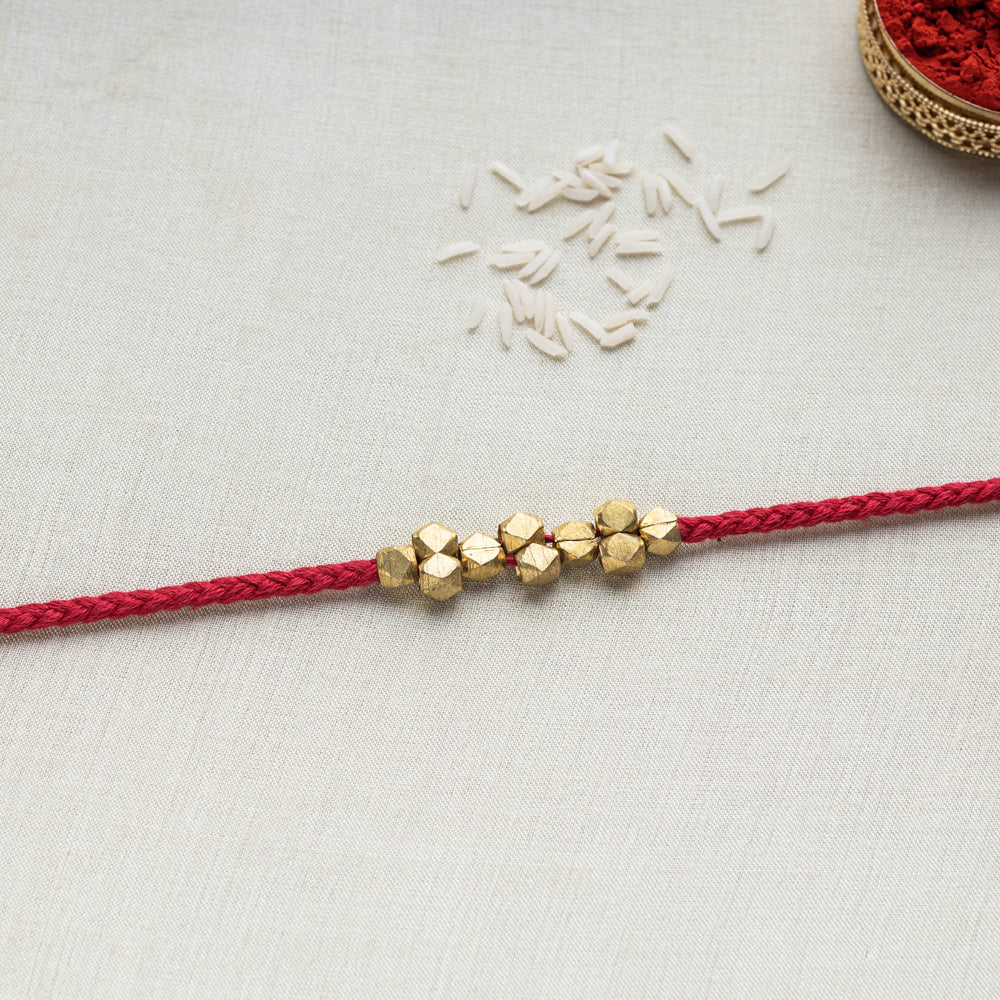 Tribal Dokra Craft Brass & Threadwork Rakhi 03