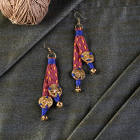 The Tribal Drops Handcrafted Dhokra Earrings in fabric