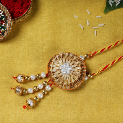 Flower - Bamboo Craft Beadwork Lumba Rakhi by Baansuli