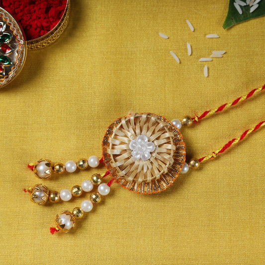 Flower - Bamboo Craft Beadwork Lumba Rakhi by Baansuli