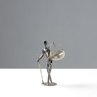 man metal sculpture