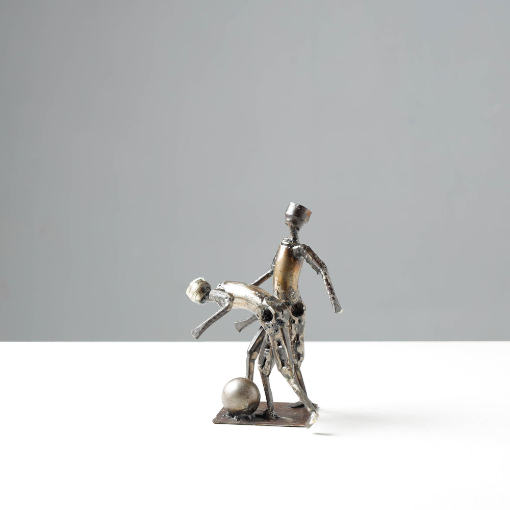 player metal sculpture