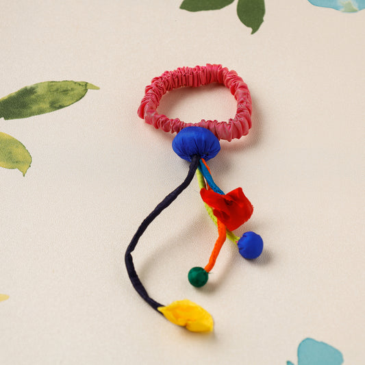 Handmade Poppy Rubber Band by Jugaad