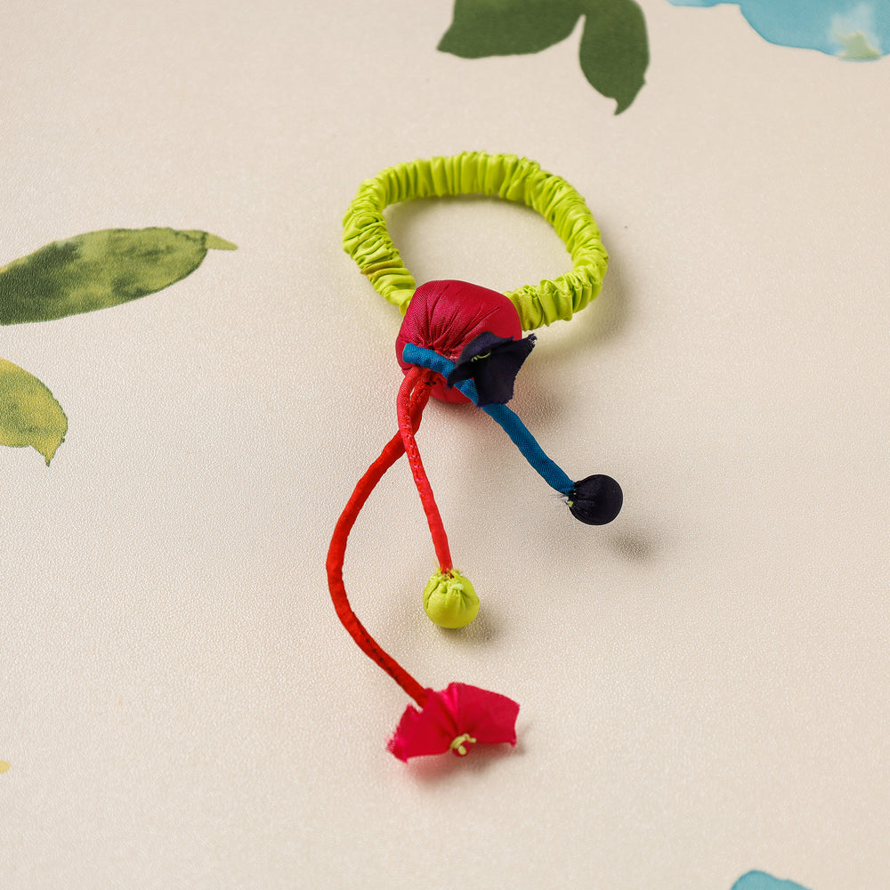 Handmade Poppy Rubber Band by Jugaad