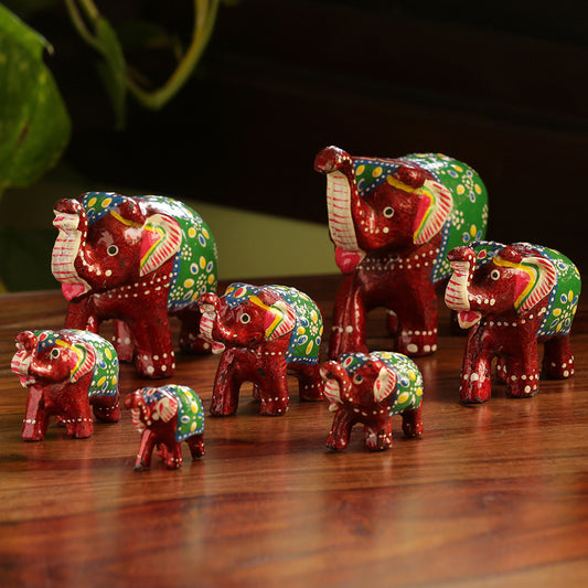 'Seven Tuskers In Maroon' Hand Carved & Handpainted Showpiece In Resin (Set of 7)