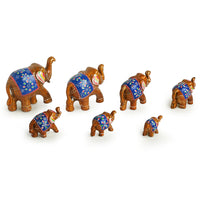 'Seven Tuskers In Brown' Hand Carved & Handpainted Showpiece In Resin (Set of 7)