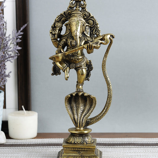 Brass Metal Handcrafted Lord Ganesha on Snake (2.7 x 4.2 in)