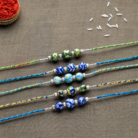 Patwa Threadwork Blue Pottery Beads Rakhi (set of 5)