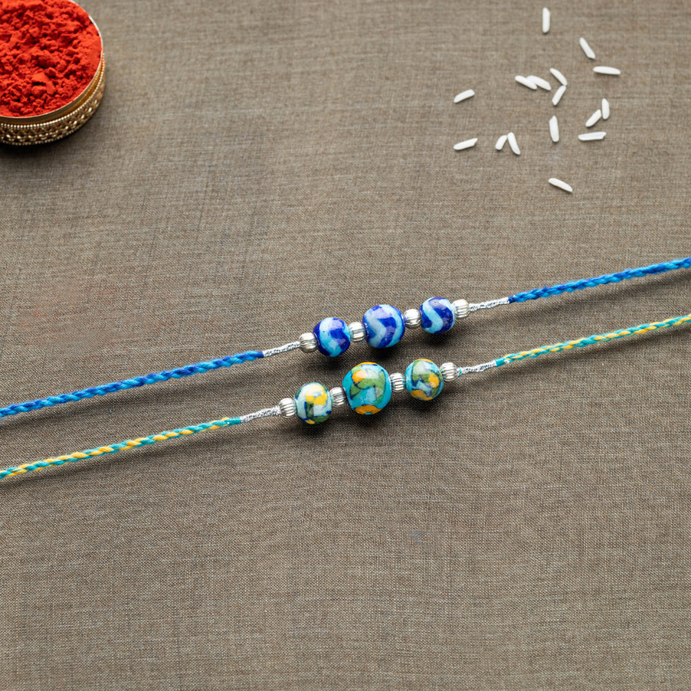Patwa Threadwork Blue Pottery Beads Rakhi (set of 2)
