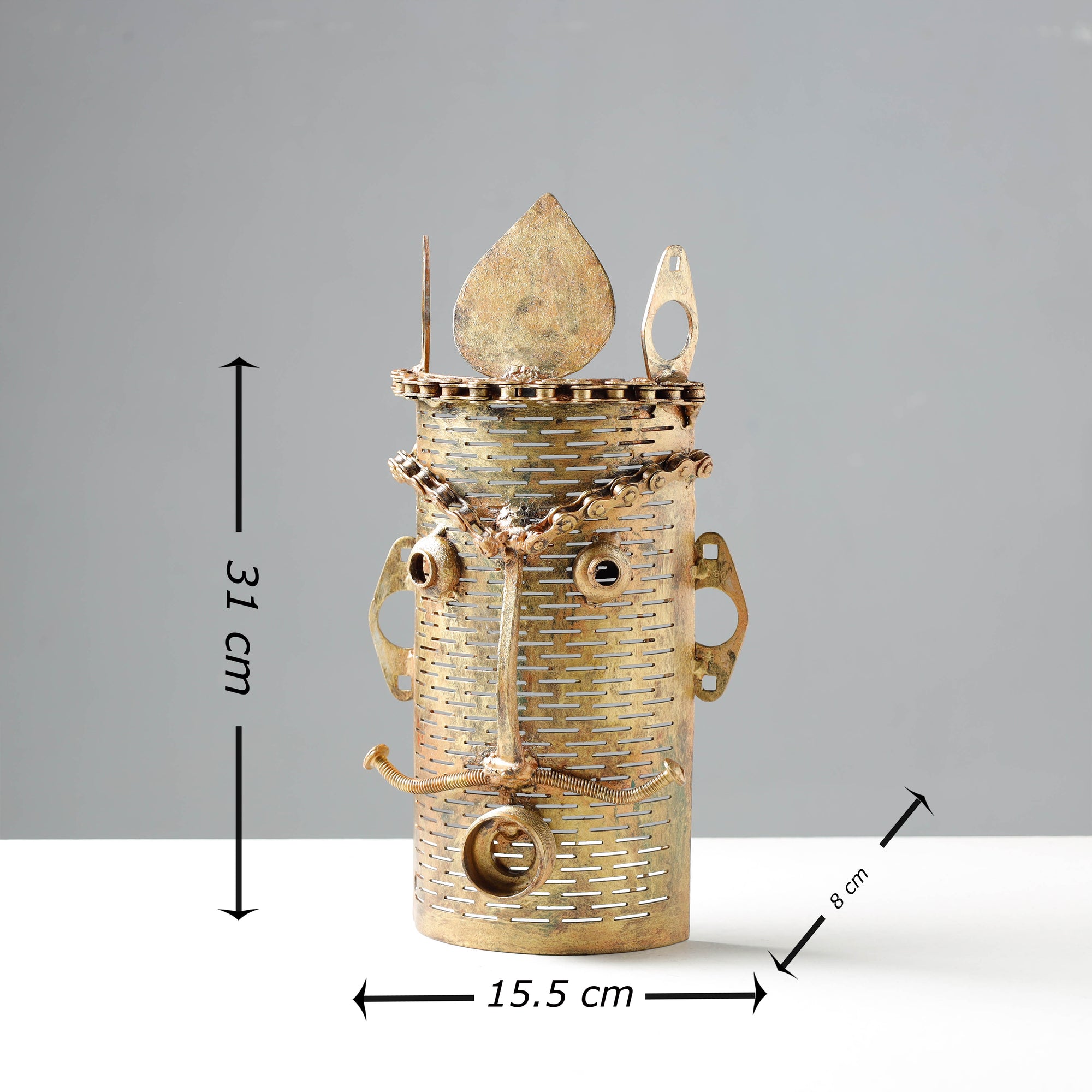 metal face sculpture