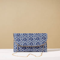 printed sling clutch