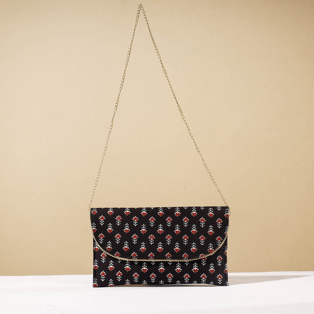 printed sling clutch