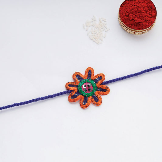 Flower - Upcycled Thread & Beadwork Kids Rakhi by Jan Sandesh