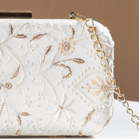 embroidery clutch