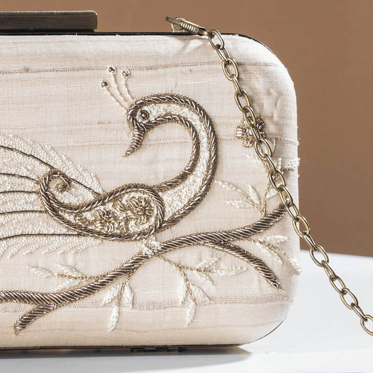 embroidery sling clutch