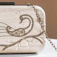 embroidery sling clutch