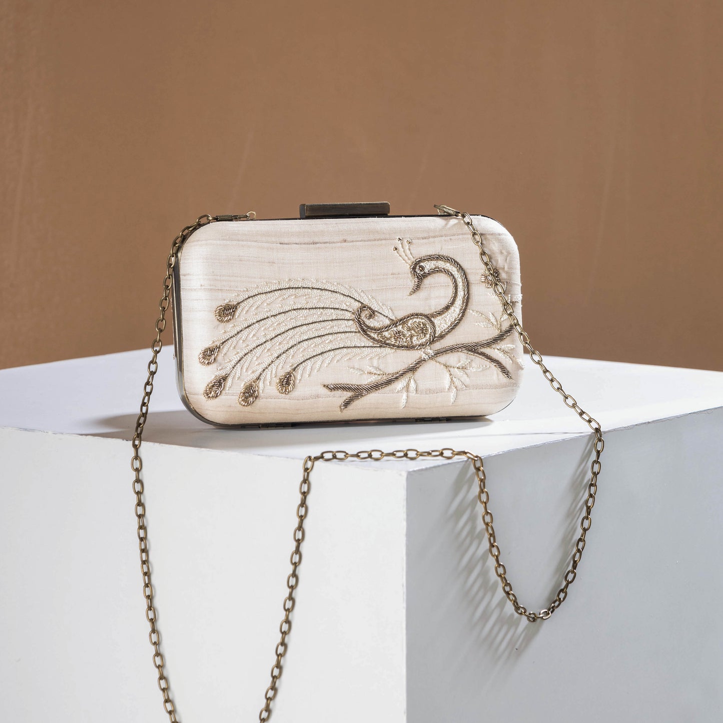 embroidery sling clutch