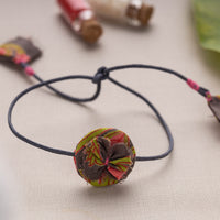 Multicolor Fabric Artisanal Rakhi by Lukka Chuppi with Kumkum & Chawal