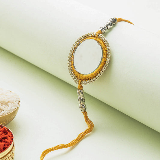 Chakra - Mirror & Crochet Work Rakhi by Abira Creations